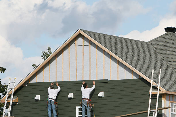 Professional Siding Installation technician working in Arlington, OH